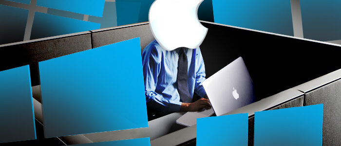 zakenman met laptop omringd door logo's van Windows en Mac