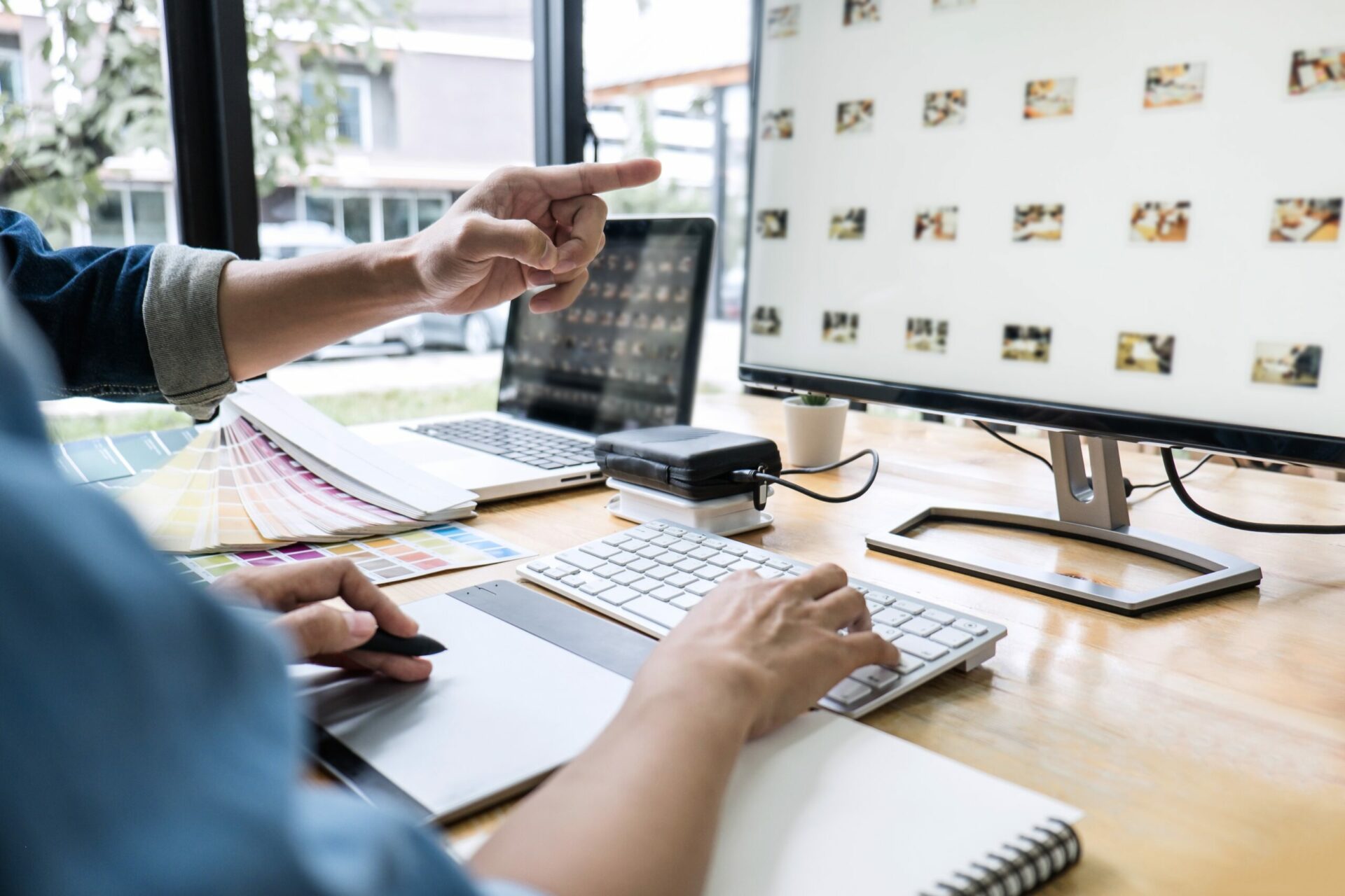 Designers select an image for the development of a PowerPoint template.